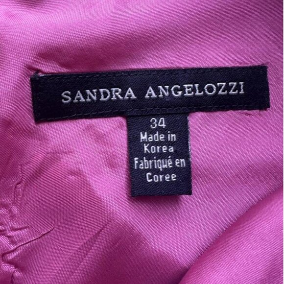 Vintage Sandra Angelozzi plaid dress in a warm tartan pattern - Picture 4 of 8